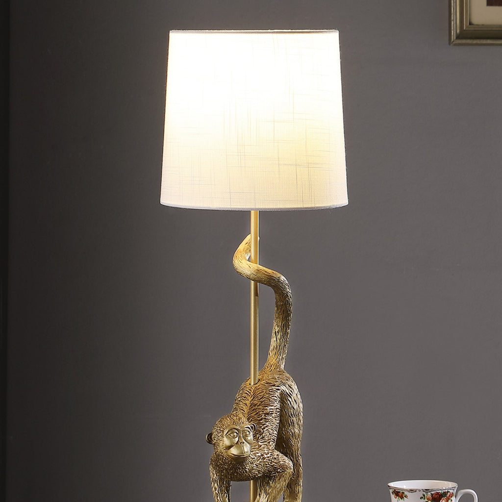 24-Inch Old World Gold Capuchin Monkey Table Lamp with Cotton/Linen Shade - Golden White