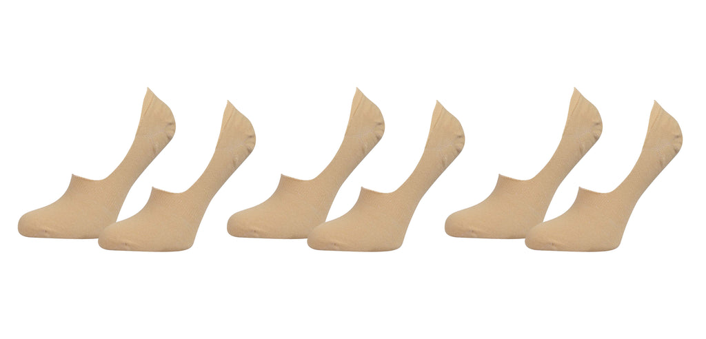 Set of six beige socks on a white background