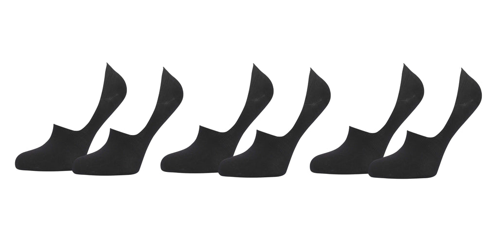 Set of six black ankle socks on a white background